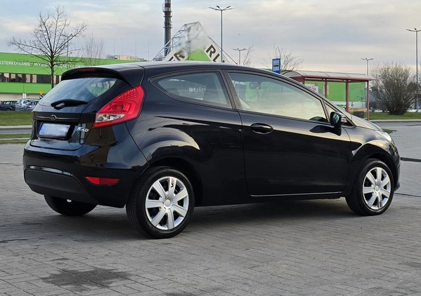 Ford Fiesta cena 16900 przebieg: 180000, rok produkcji 2009 z Bełchatów małe 254